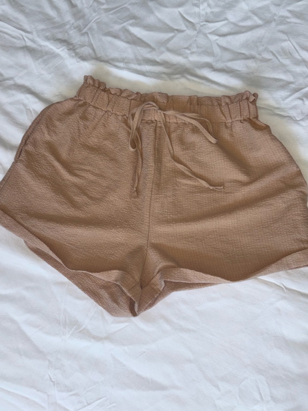 Pink paper bag style shorts